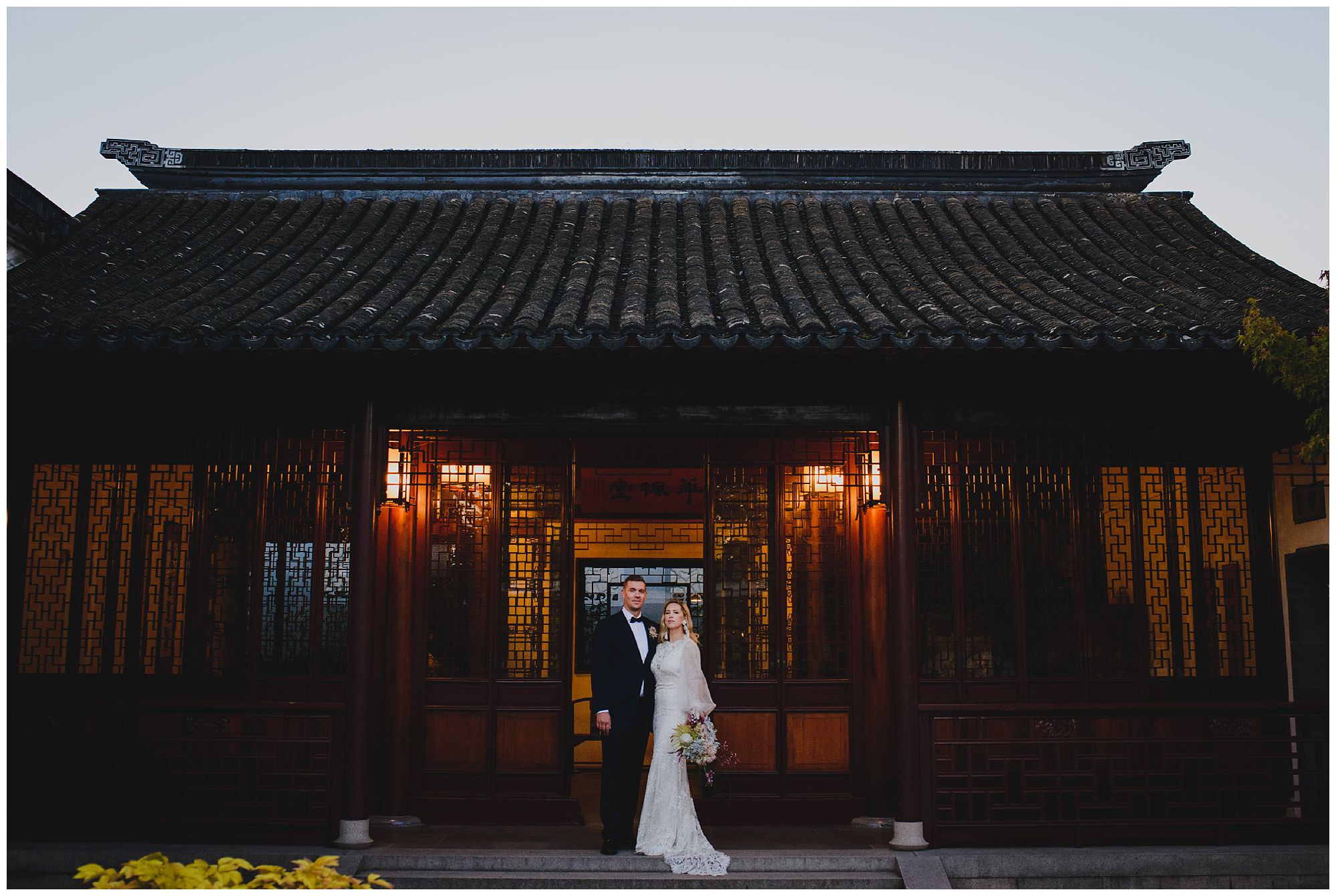 stylish bride and groom at sunset after their wedding ceremony at Dr. Sun Yat-Sen Classical Chinese Gardens, elopement, intimate wedding, candid wedding photography, sunset wedding photography