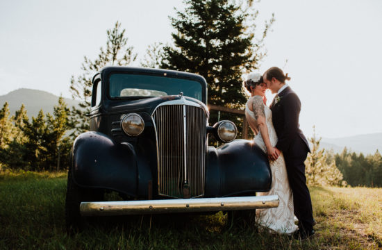 bride and groom in front of vintage truck at shylynn ranch in salmon arm bc